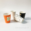 Disposable paper cups for hot drinks